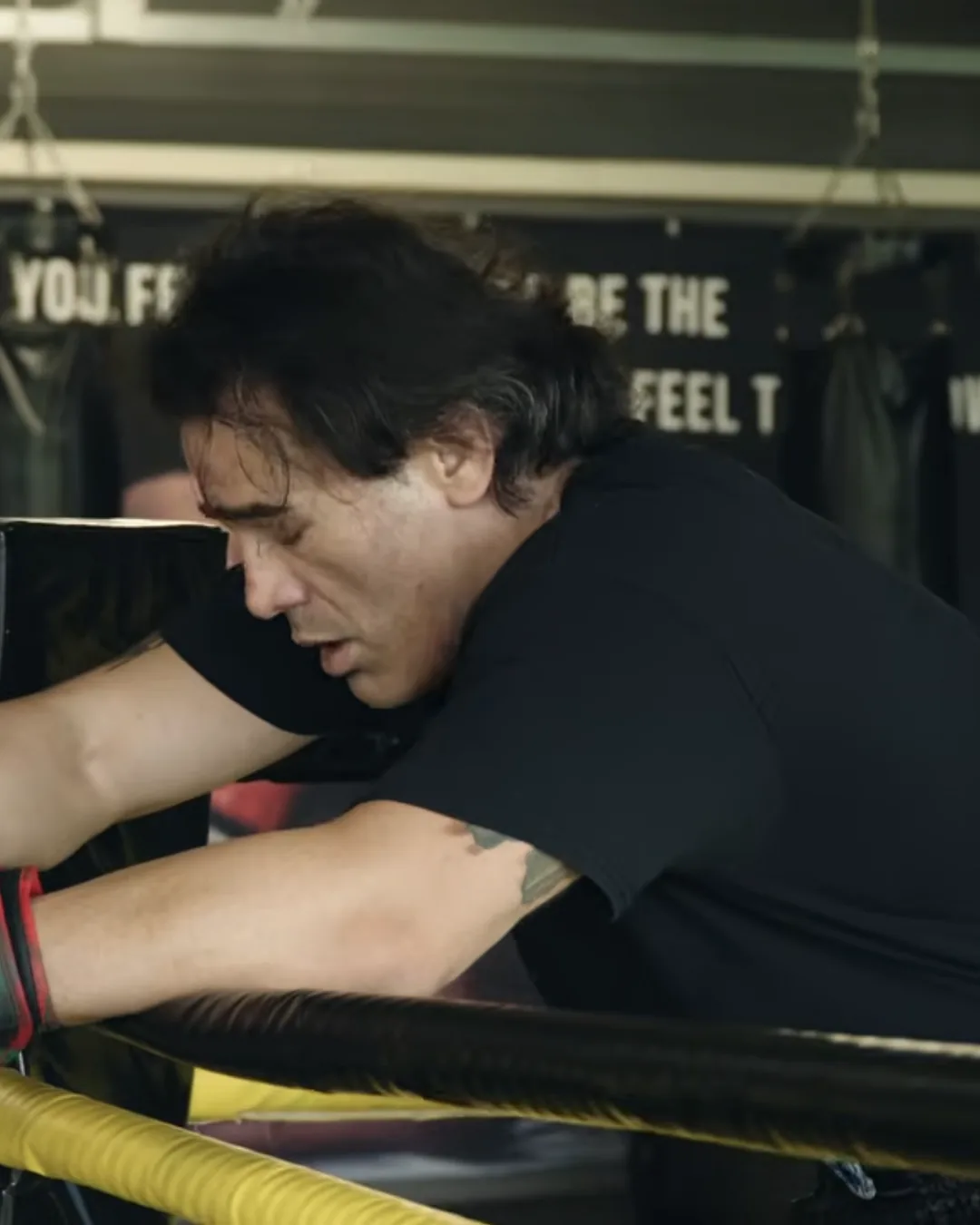 Paul Miller resting on the ropes during training before Duel: Arena 1